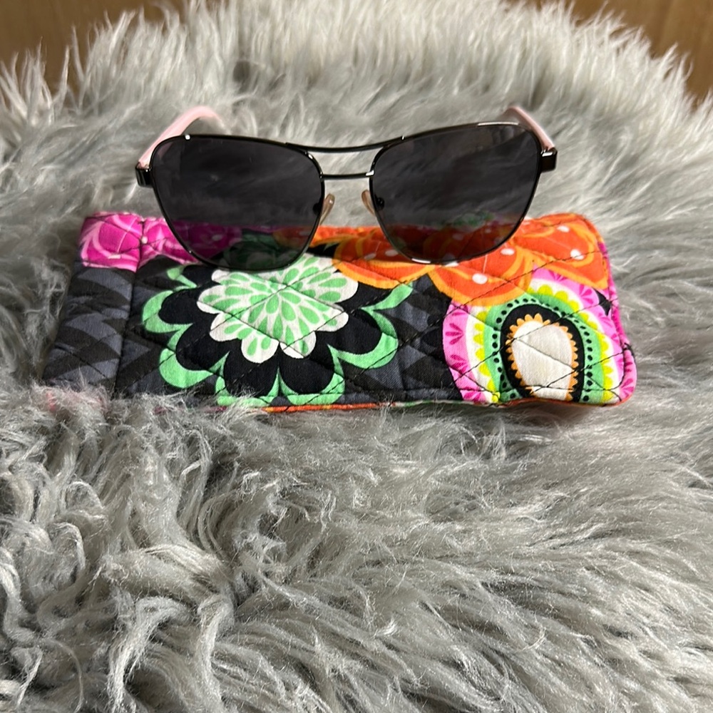 Stylish Black Sunglasses with Pink Accents